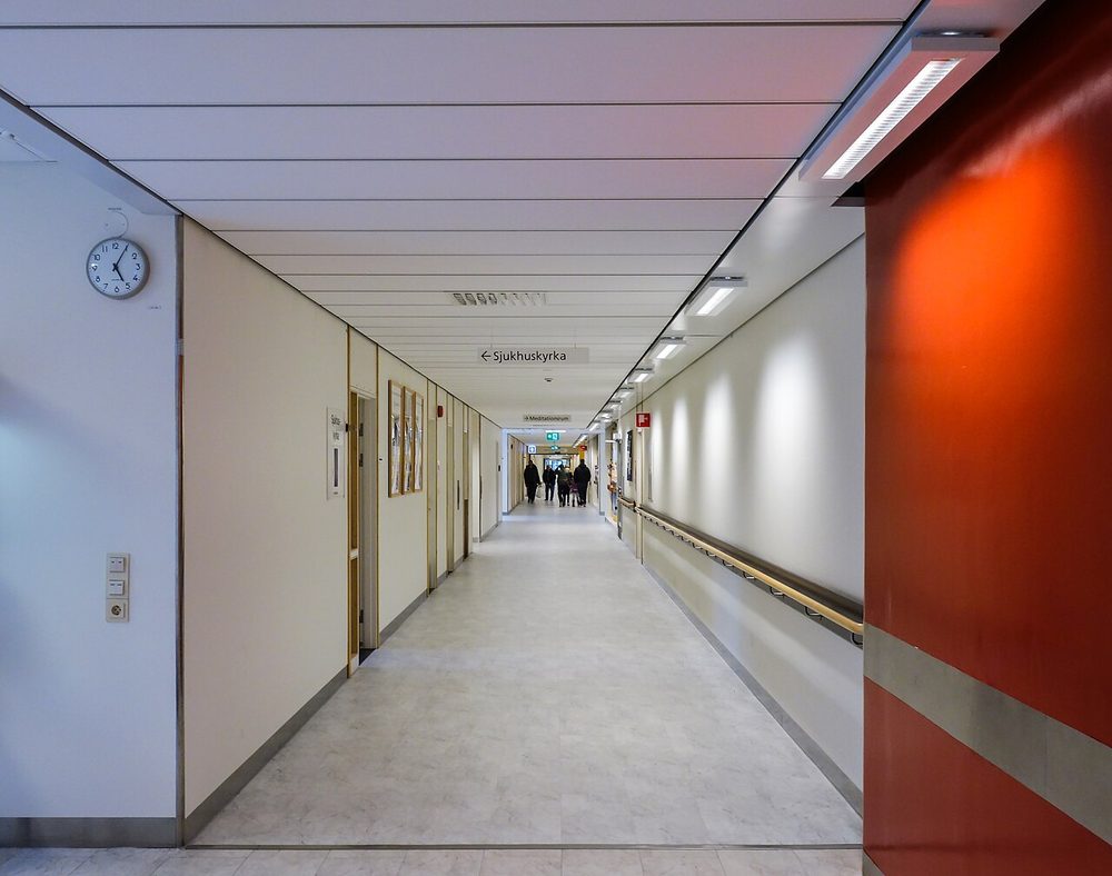 A long, bright hospital corridor